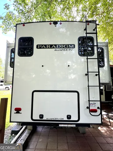 a backyard of a house with seating space