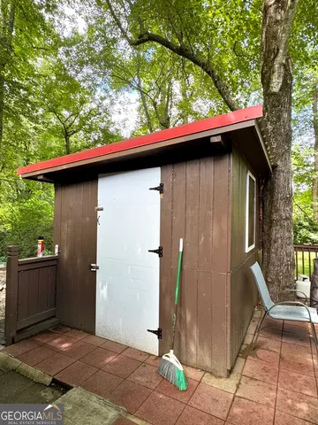 a bathroom with a sink toilet and mirror