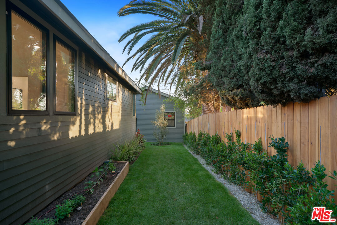 5252 Range View Avenue Los Angeles, CA 90042 - Photo 11 of 41 a view of a house with a backyard