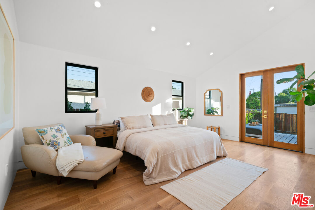 5252 Range View Avenue Los Angeles, CA 90042 - Photo 21 of 41 a bedroom with two beds and a couch