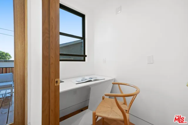 a view of hallway with washer and dryer