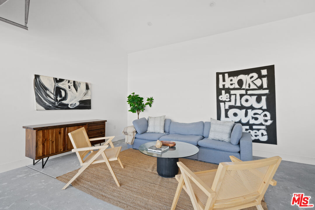 5252 Range View Avenue Los Angeles, CA 90042 - Photo 41 of 41 a living room with furniture and wooden floor
