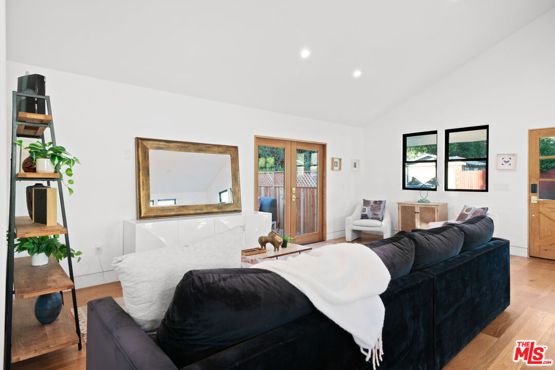 5252 Range View Avenue Los Angeles, CA 90042 - Photo 6 of 41 a living room with furniture a two couches and a potted plant