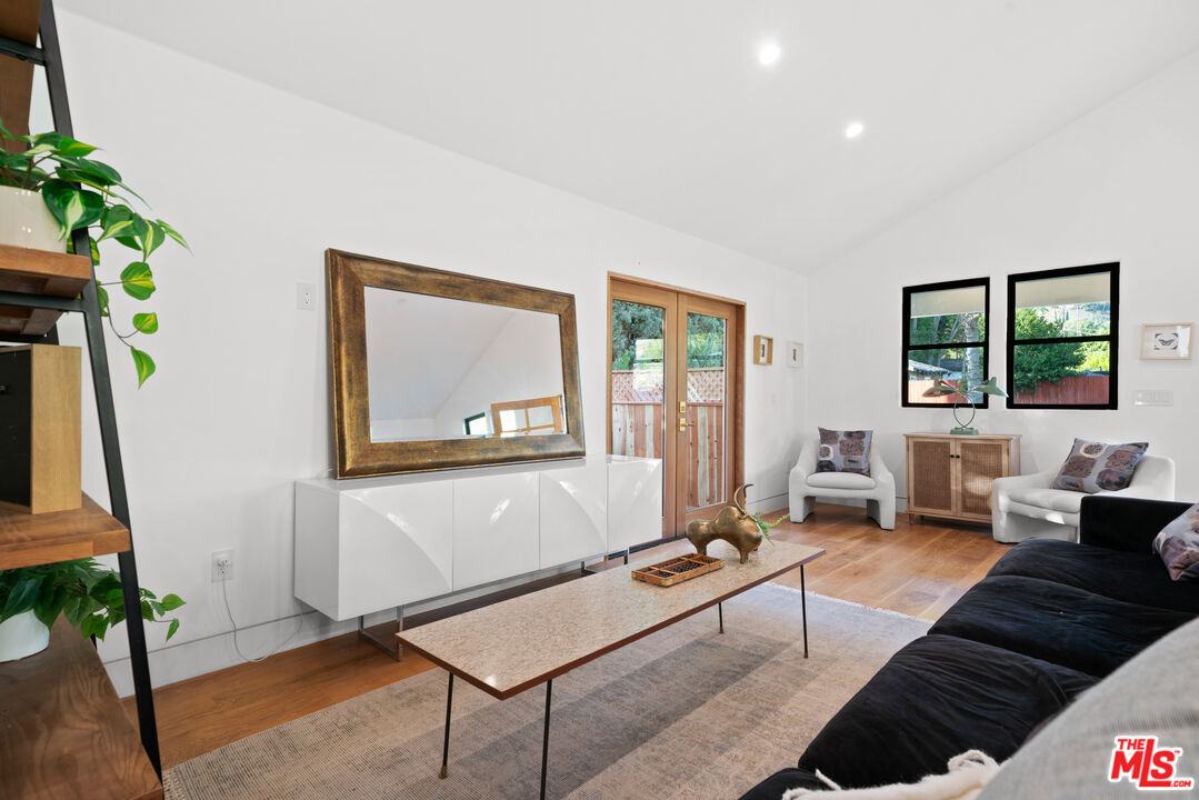 5252 Range View Avenue Los Angeles, CA 90042 - Photo 7 of 41 a living room with furniture and a potted plant