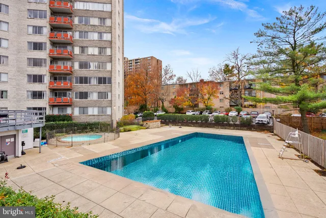 a view of swimming pool from a balcony