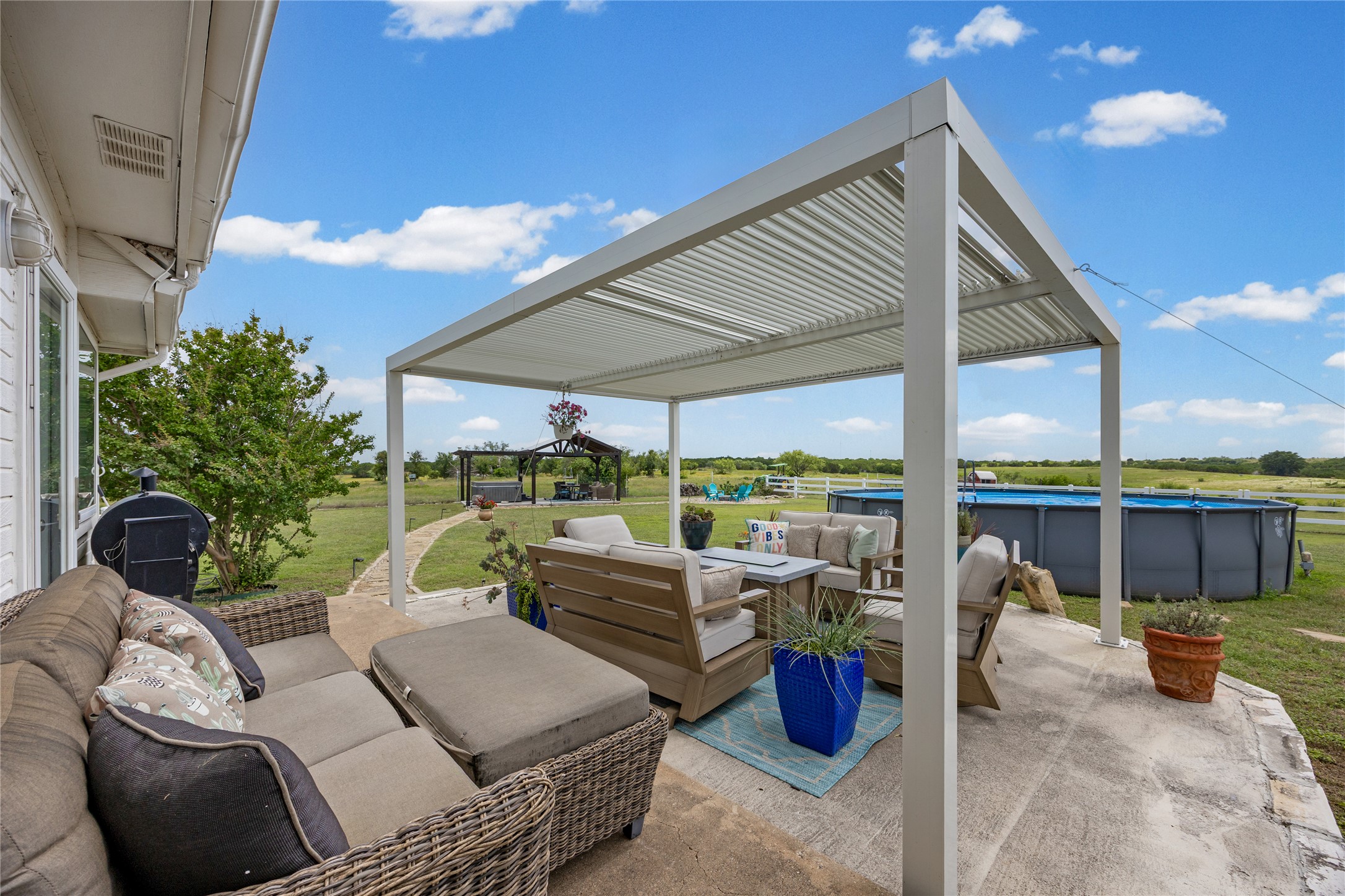 1283 Rattlesnake Trail Burnet, TX 78611 - Photo 32 of 39 a outdoor living space with furniture and city view