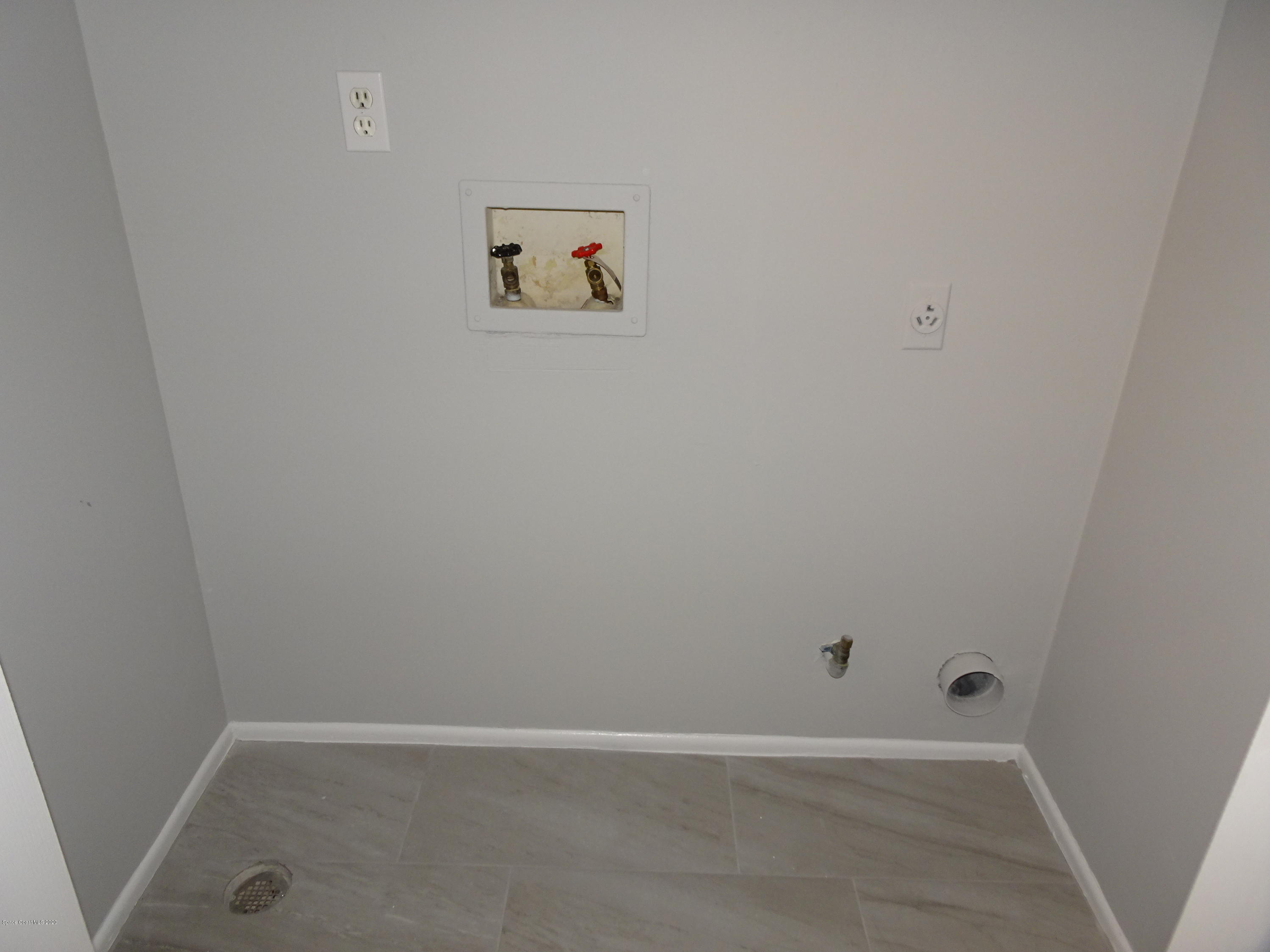 4875 Sisson Road Titusville, FL 32780 - Photo 11 of 14 a view of an empty room