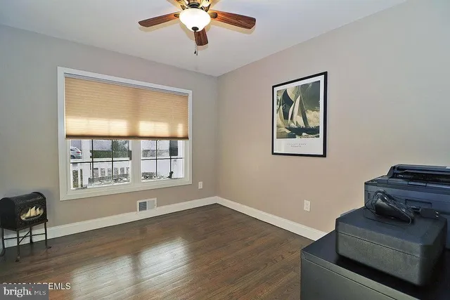 a view of a kitchen with a sink and cabinet