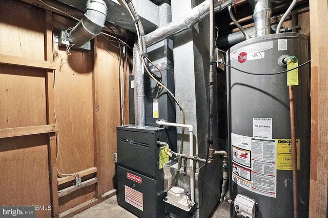 a view of a roof deck with table and chairs and wooden floor