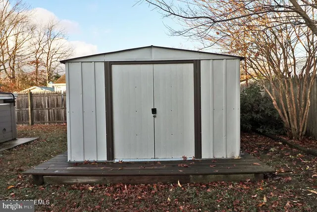 a view of a house with a back yard