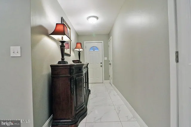 a view of a hallway with workspace