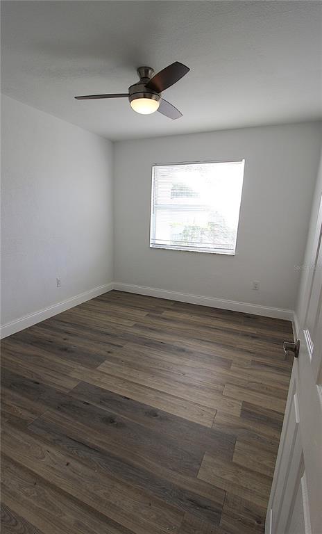 2345 Floyd Street Sarasota, FL 34239 - Photo 14 of 18 wooden floor in an empty room