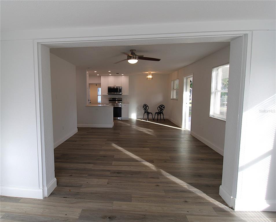 2345 Floyd Street Sarasota, FL 34239 - Photo 5 of 18 a view of a living room with wooden floor