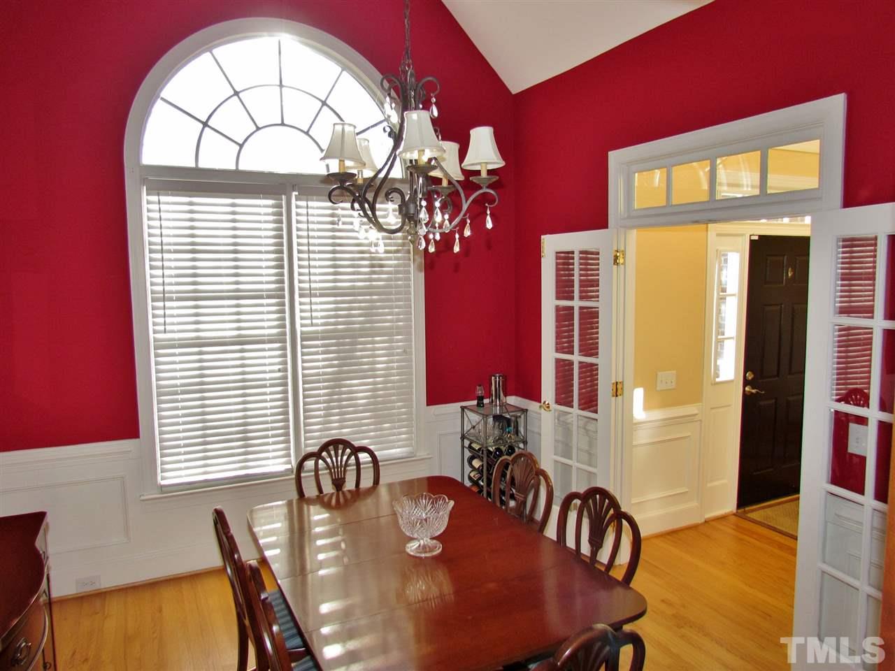 513 Tufts Court Raleigh, NC 27609 - Photo 4 of 25 a view of a dining room with furniture and chandelier