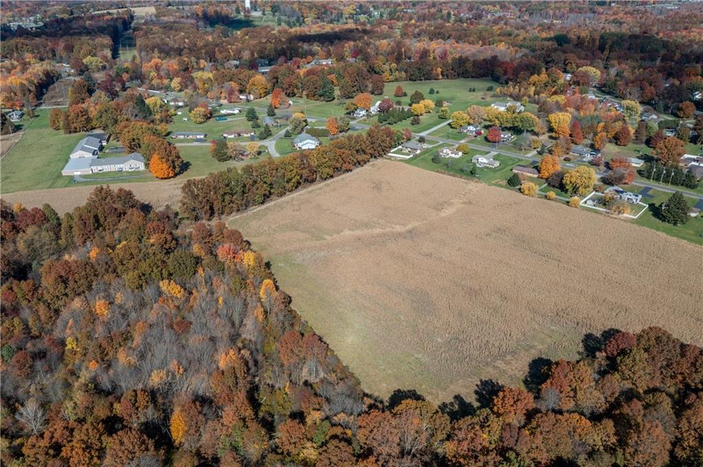 0 South Keel Ridge Road Hermitage, PA 16148 - Photo 29 of 29 an aerial view of a house with a yard and lake view in back