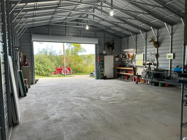 $699,000 | 10550 West Holland Lake Road, Greenville, MI 48838