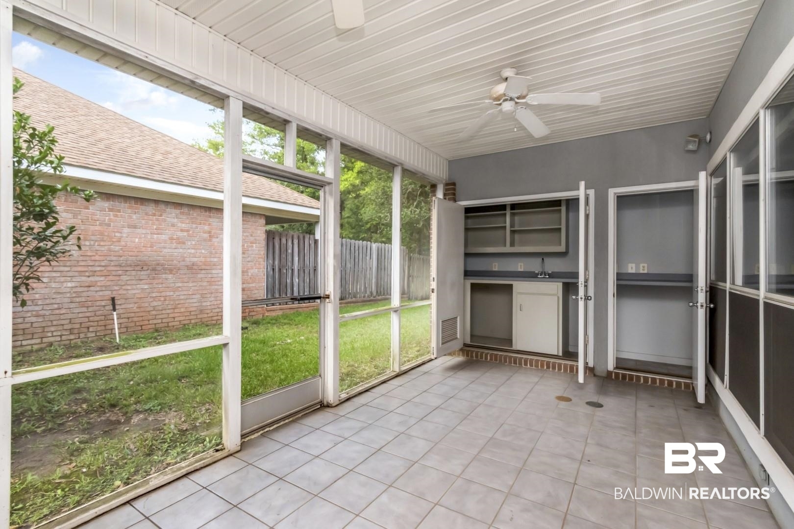 1205 Hillcrest Crossing East Mobile, AL 36695 - Photo 38 of 40 Unfurnished sunroom with ceiling fan
