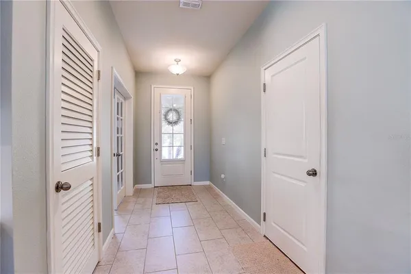 a room with furniture and a flat screen tv