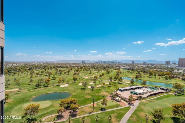 a view of a city with tall buildings