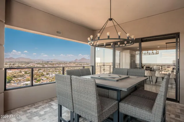 a view of a dining room with furniture window and outside view