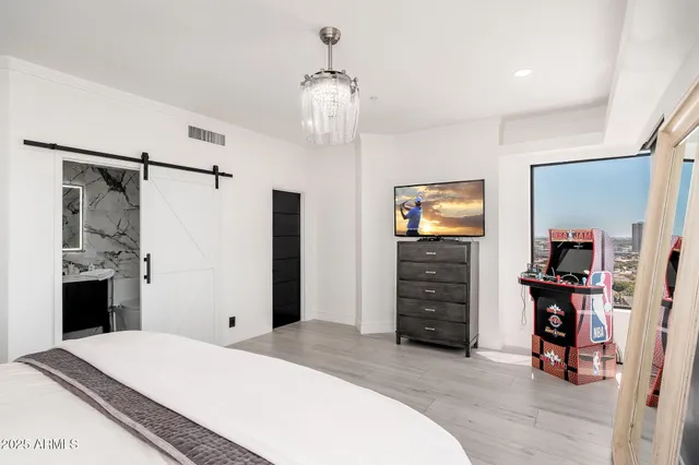 a front view of a building with a yard