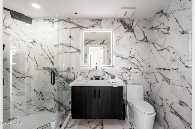 a view of a city with tall buildings