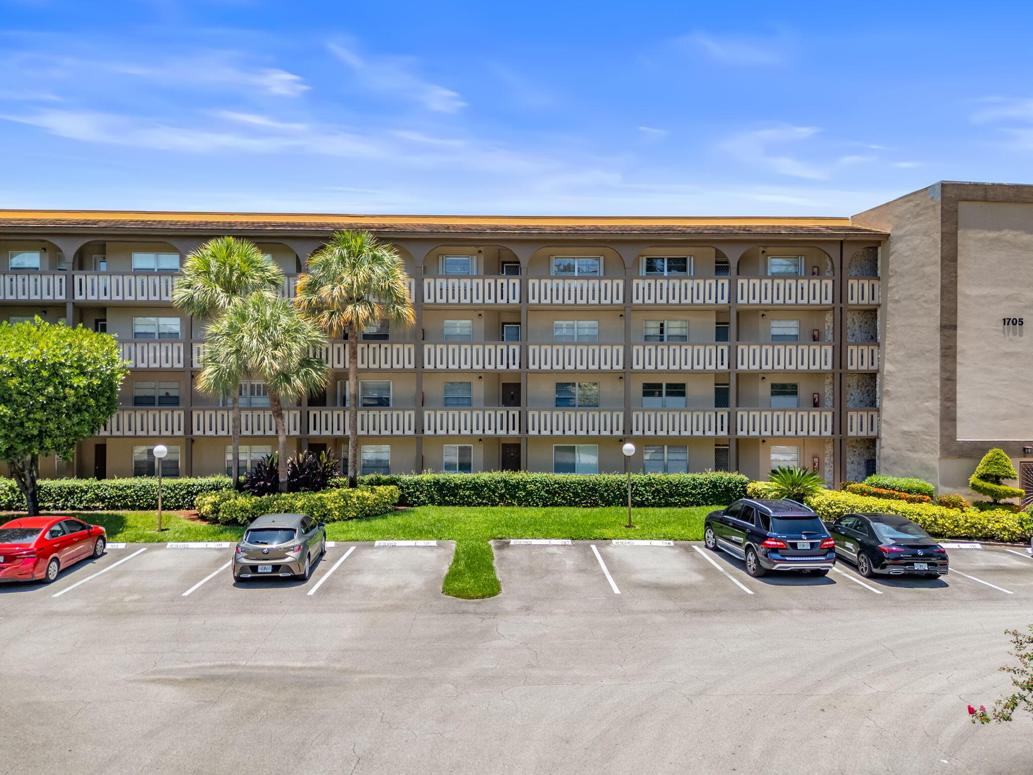 1705 Andros Isle, Unit F2 Coconut Creek, FL 33066 - Photo 2 of 36 4-web-or-mls-DJI_20250708133322_0109_D