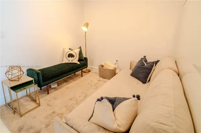 a bed room with furniture and a lamp