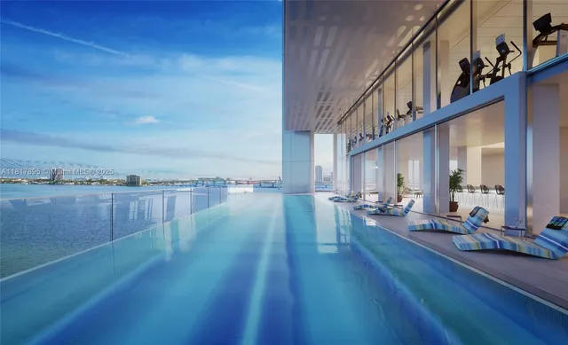 a view of a living room and hardwood floor