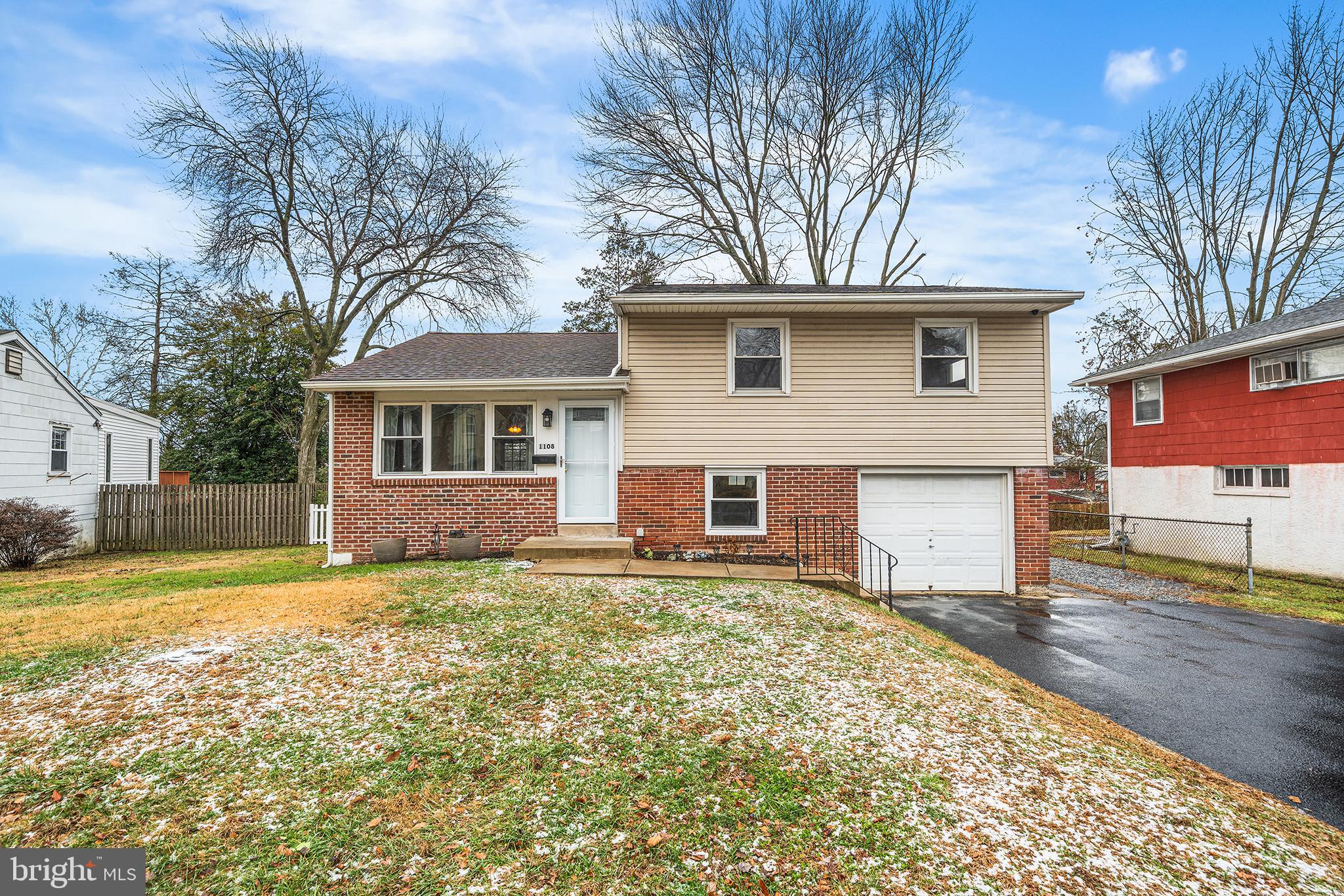1108 Providence Road Secane, PA 19018 - Photo 1 of 33 a view of a yard in front of a house with large tree