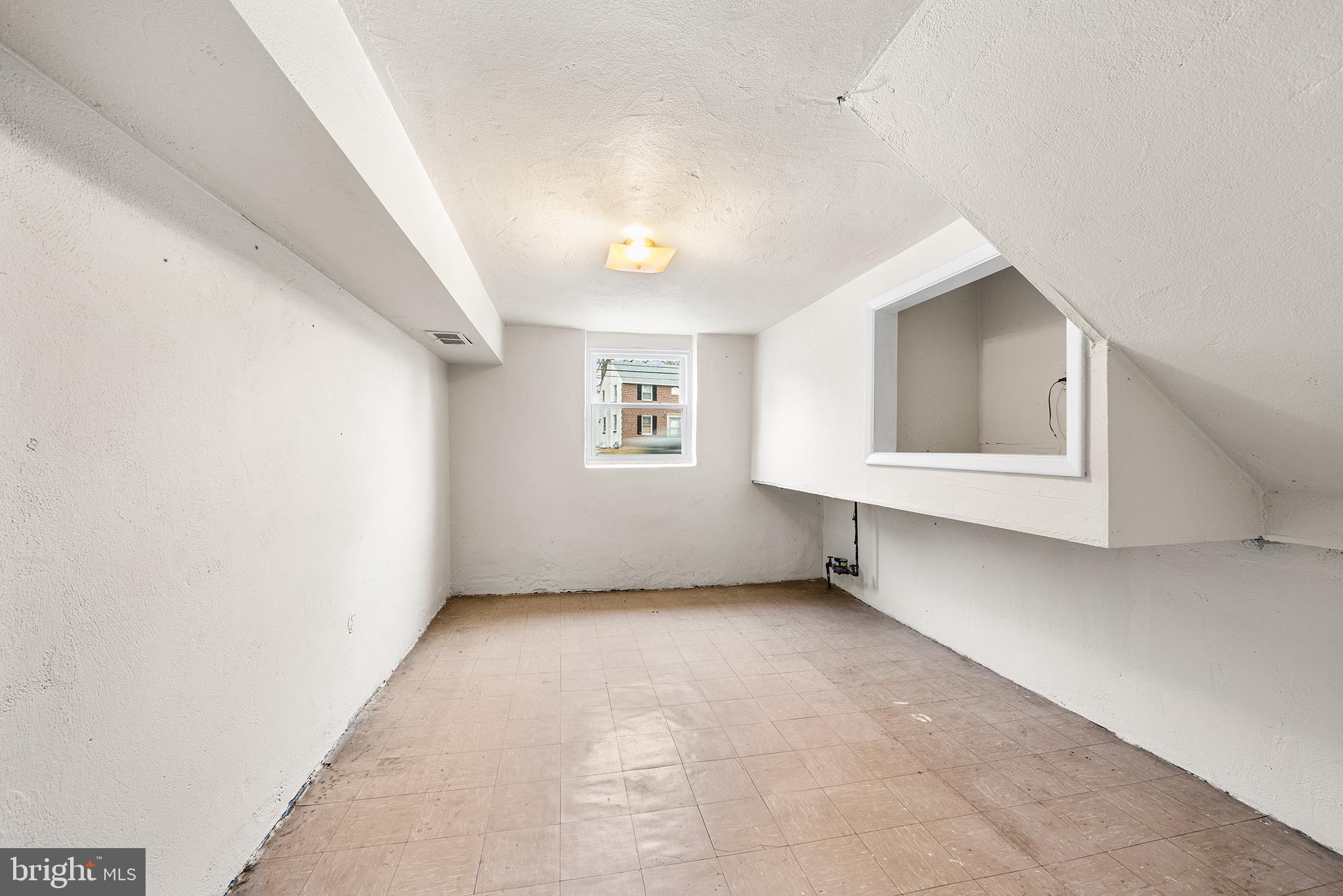 1108 Providence Road Secane, PA 19018 - Photo 21 of 33 an empty room with windows