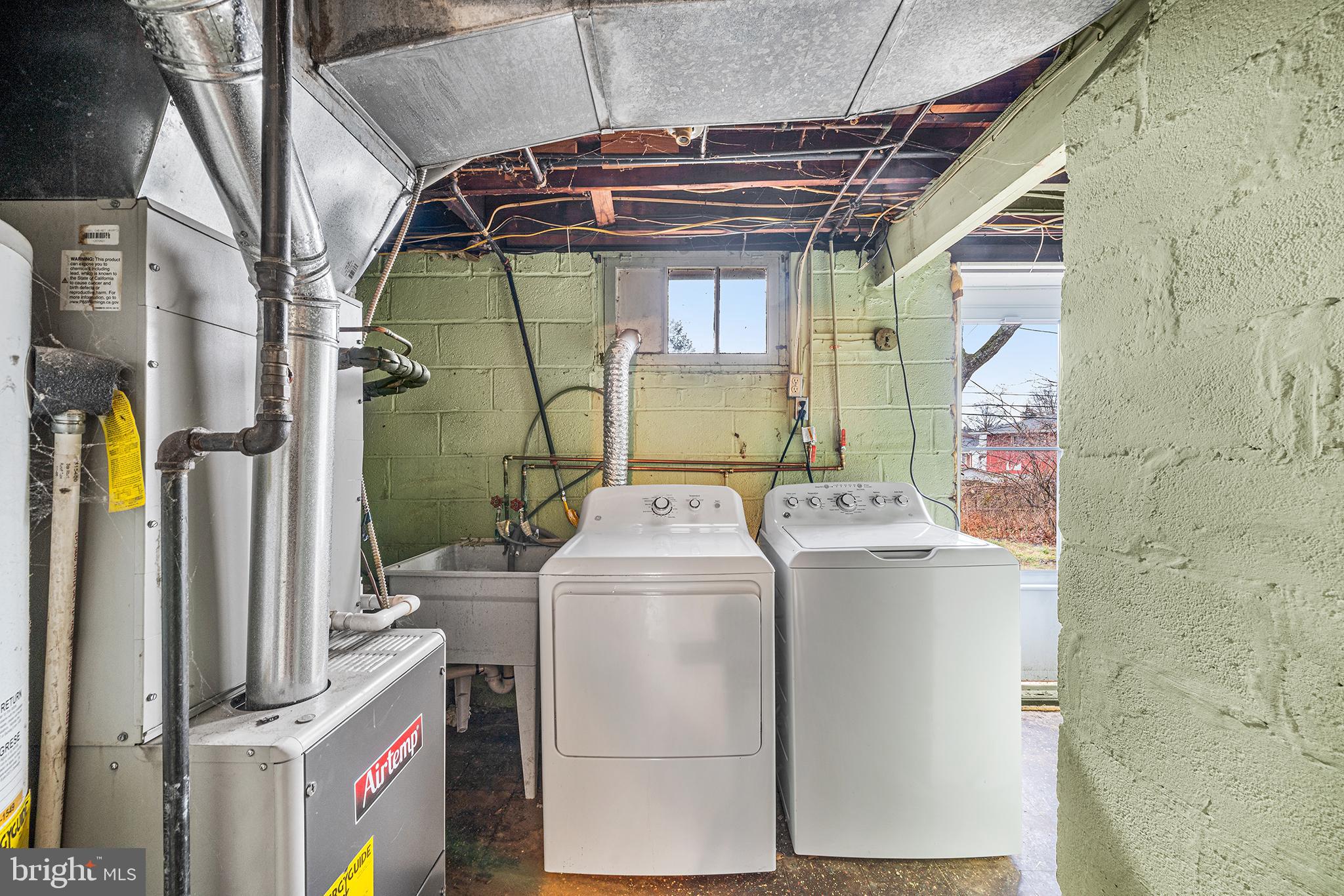 1108 Providence Road Secane, PA 19018 - Photo 22 of 33 a utility room with dryer and washer