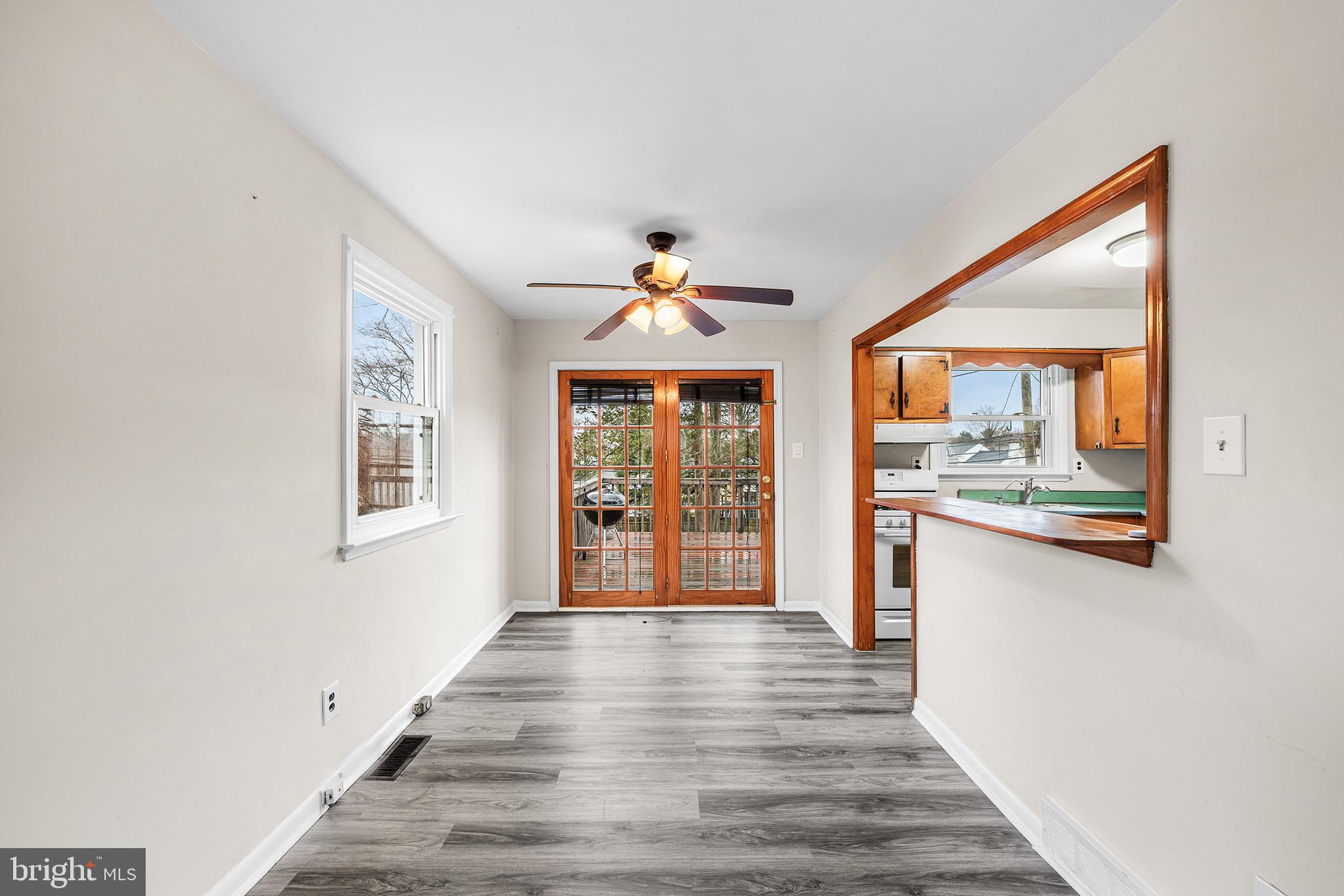 1108 Providence Road Secane, PA 19018 - Photo 8 of 33 a view of an entryway with wooden floor and windows