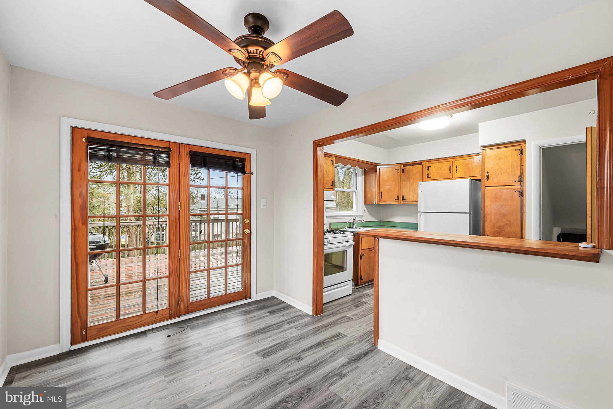 1108 Providence Road Secane, PA 19018 - Photo 9 of 33 a view of an empty room with window and wooden floor