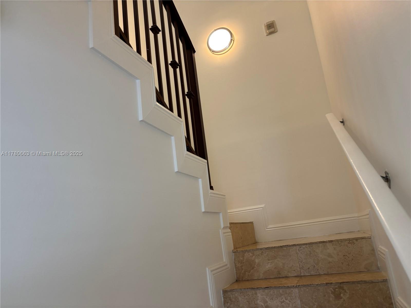 2415 Northwest 16th St Road, Unit 103 Miami, FL 33125 - Photo 34 of 42 a view of entryway with stairs