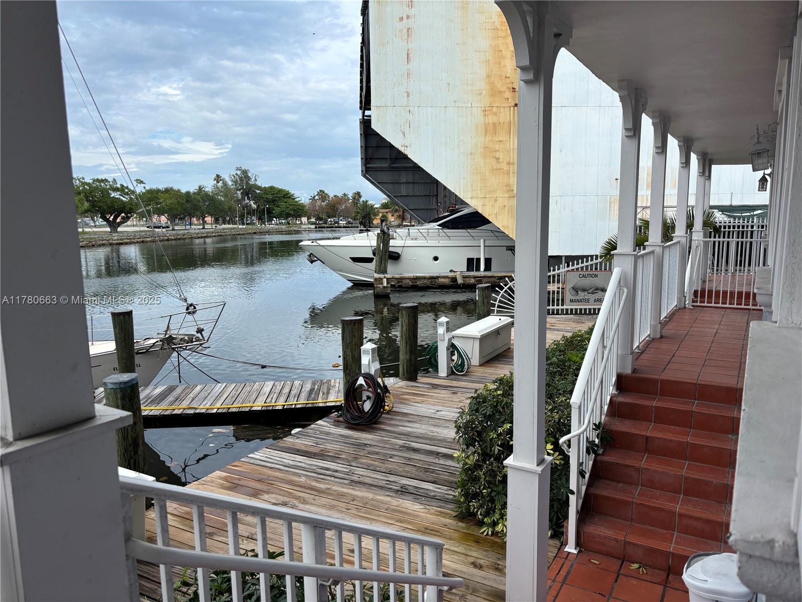 2415 Northwest 16th St Road, Unit 103 Miami, FL 33125 - Photo 39 of 42 a view of balcony and deck