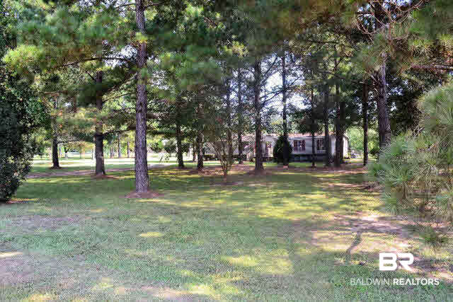 22700 Russian Road Gulf Shores, AL 36542 - Photo 23 of 25 View from Russian Road. Home sits well off the main road.