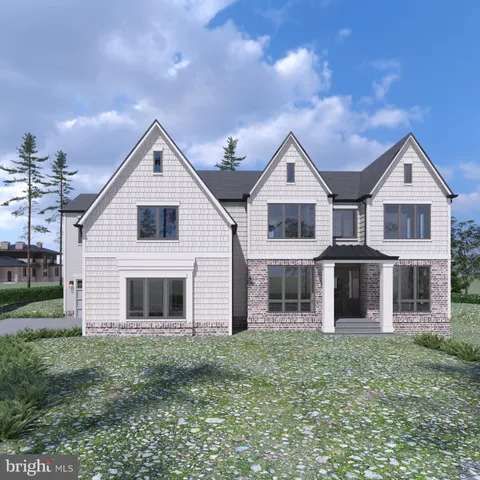 a view of house with yard