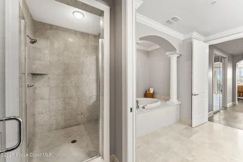 a bathroom with a sink a mirror and a shower