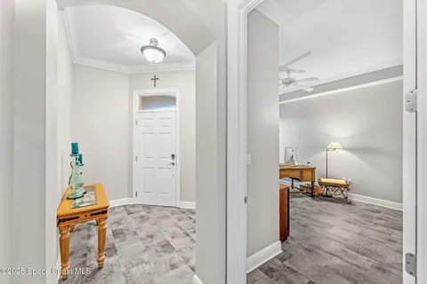 a bedroom with a bed and a view of en suite bathroom