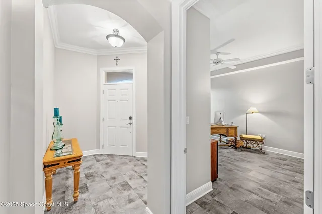 a bedroom with a bed and a view of en suite bathroom