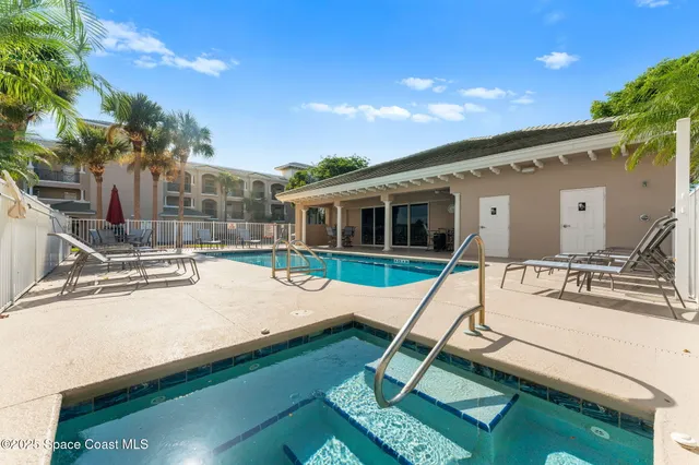 a view of a building with a garden
