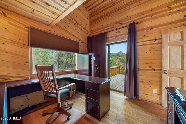 a view of an empty room with a staircase