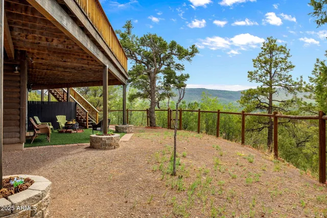 a terrace of a house with table and chairs