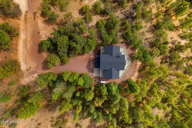 a view of a balcony with wooden fence
