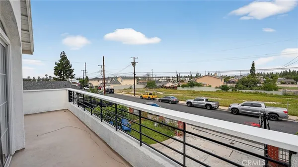 a view of a balcony with city view