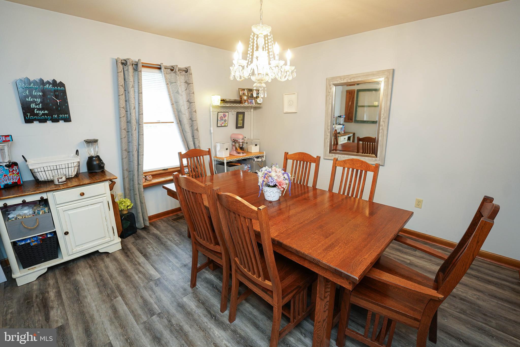 29325 West Line Road Delmar, MD 21875 - Photo 12 of 48 a view of a dining room with furniture and window