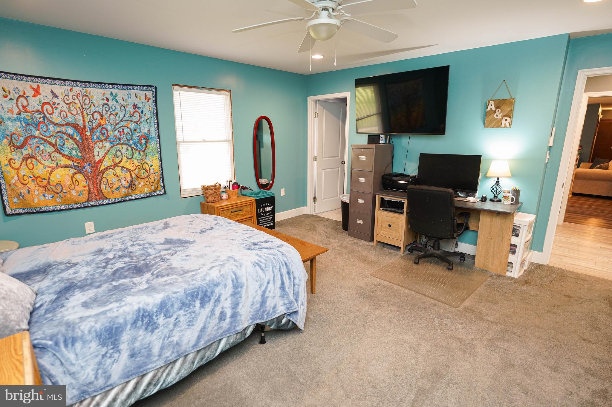 29325 West Line Road Delmar, MD 21875 - Photo 22 of 48 a bedroom with a bed and a flat screen tv