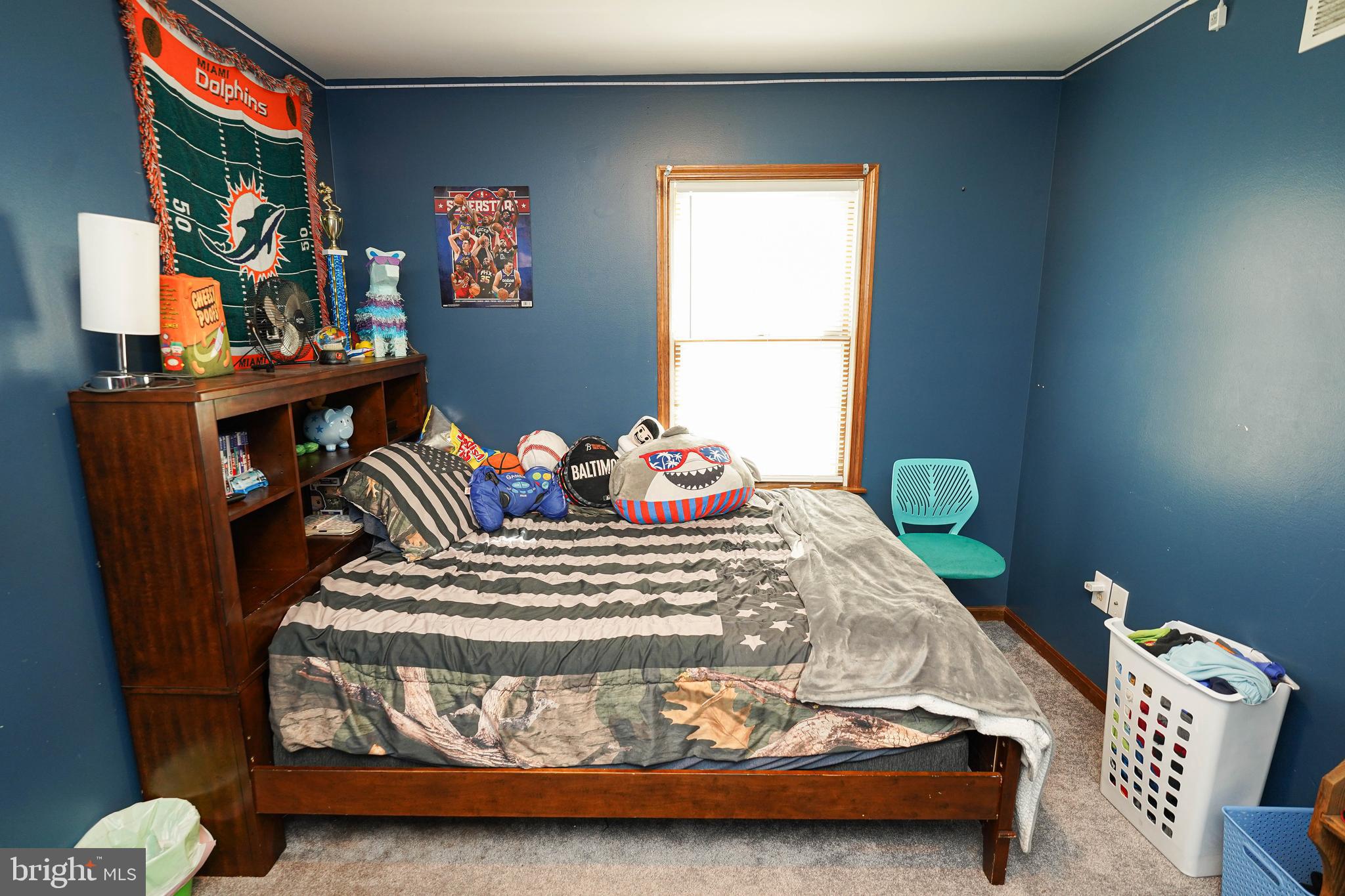 29325 West Line Road Delmar, MD 21875 - Photo 38 of 48 a bedroom with a bed and a flat screen tv