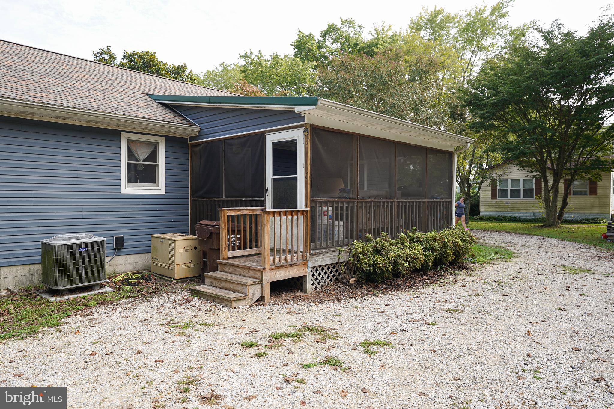 29325 West Line Road Delmar, MD 21875 - Photo 7 of 48 a backyard of a house with barbeque oven